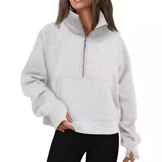 Women’s oversized half-zip sweater with kangaroo pocket, thumb holes, and high collar Mune Fashion