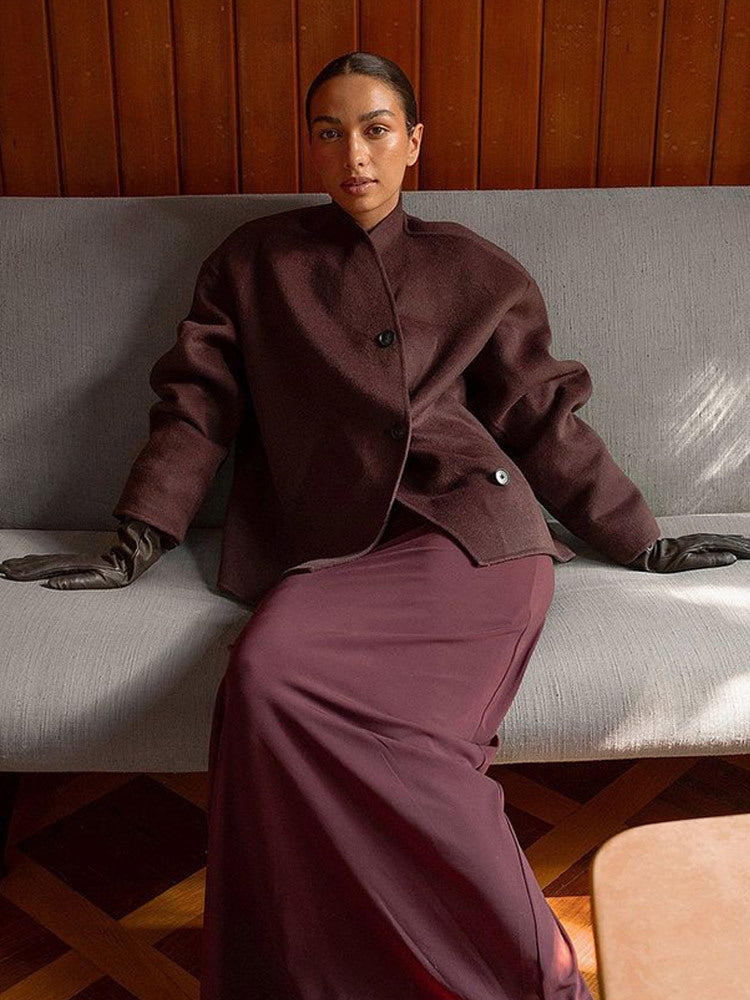 Women's short coat made of wool blend with boxy silhouette and distinctive button placket Mune Fashion