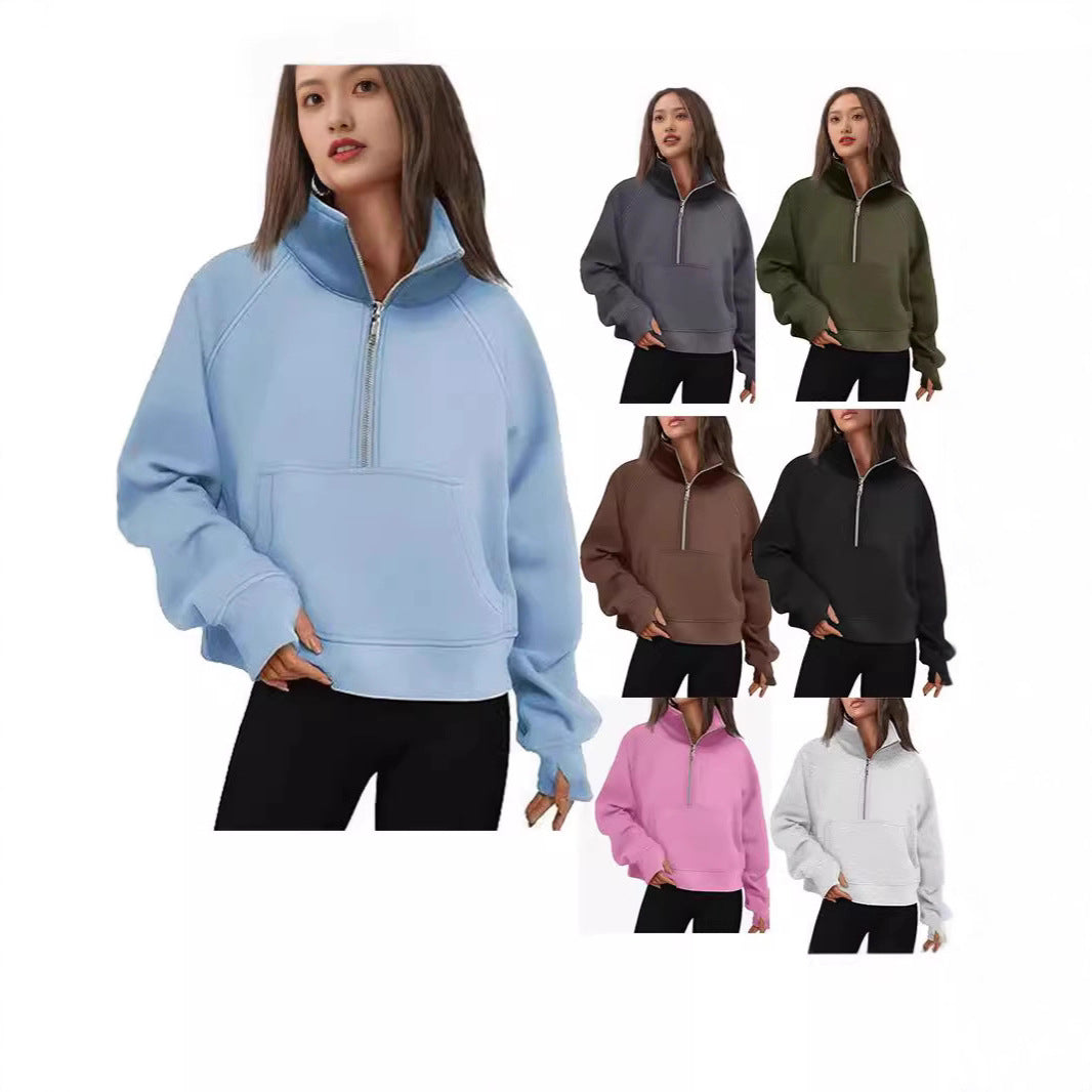 Women’s oversized half-zip sweater with kangaroo pocket, thumb holes, and high collar Mune Fashion
