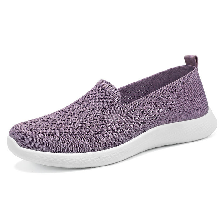Women’s seamless knit slip-on with perforated air mesh structure, ergonomic memory footbed, and lightweight EVA cushioning Mune Fashion