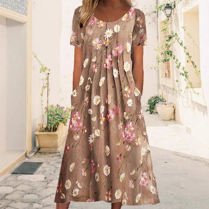 Women's nan Blumenswing midi dress with round neckline, inset pockets, and structured crepe quality Mune Fashion