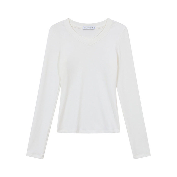 Women's long sleeve shirt with V-neck and fitted slim-fit style