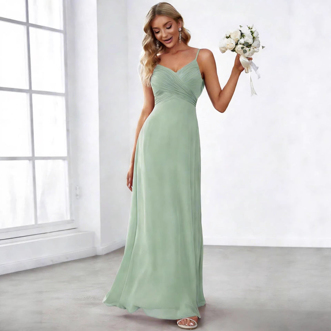 Ladies flowing chiffon evening dress with crossed draping, empire waist and fine spaghetti straps Mune Fashion