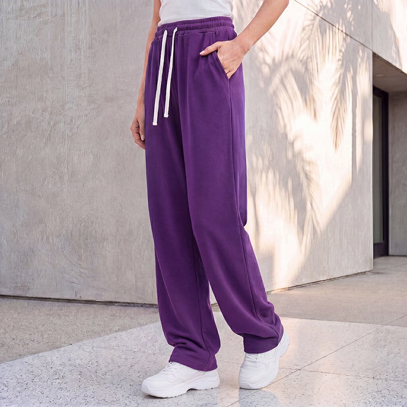 Women's wide lounge palazzo pants with high comfort waistband, drawstring, side pockets, and decorative side seam Mune Fashion