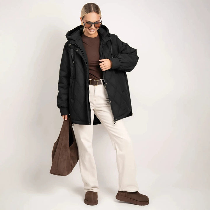 Women's quilted parka in diamond quilting pattern with hood and extended back Mune Fashion