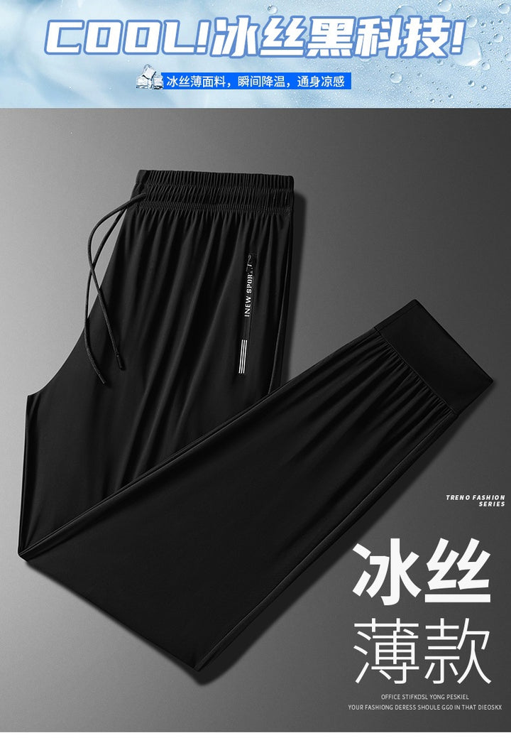 Men's sporty jogging pants with elastic waistband and practical side pockets Mune Fashion