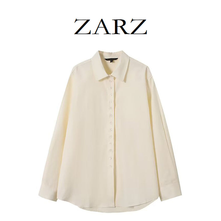 Women loose-fitting shirt blouse made of flowing material with continuous button placket Mune Fashion