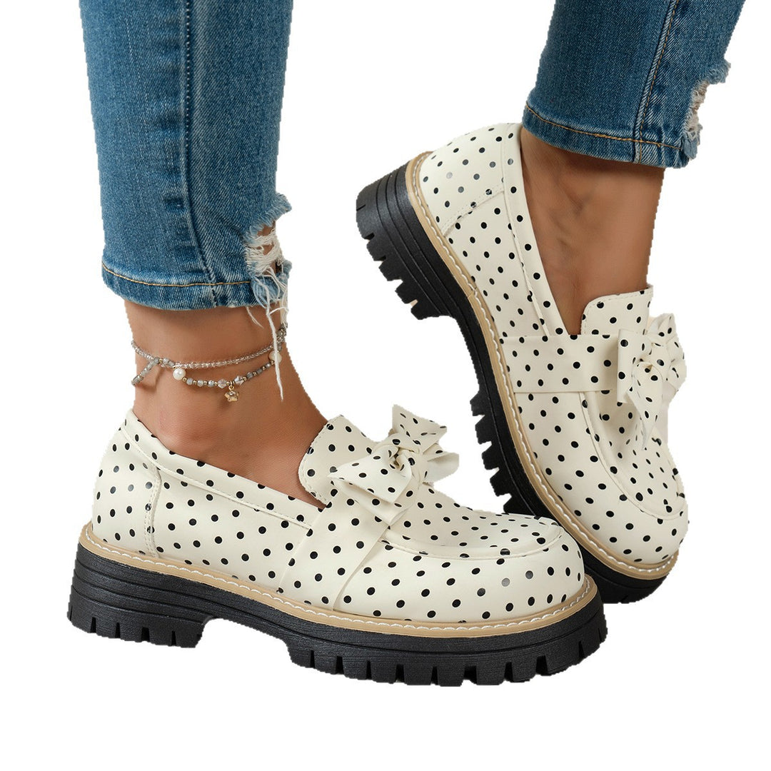 Women's casual loafers with polka dot pattern and decorative bow on a profiled platform sole Mune Fashion
