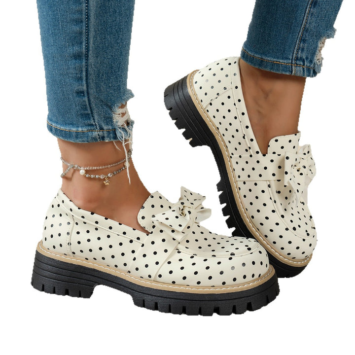 Women's casual loafers with polka dot pattern and decorative bow on a profiled platform sole Mune Fashion