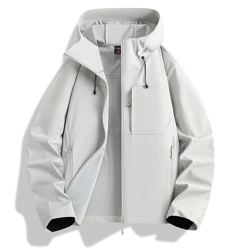 Women's lightweight waterproof hooded jacket with breathable coating, zippered pockets, and adjustable cuffs Mune Fashion
