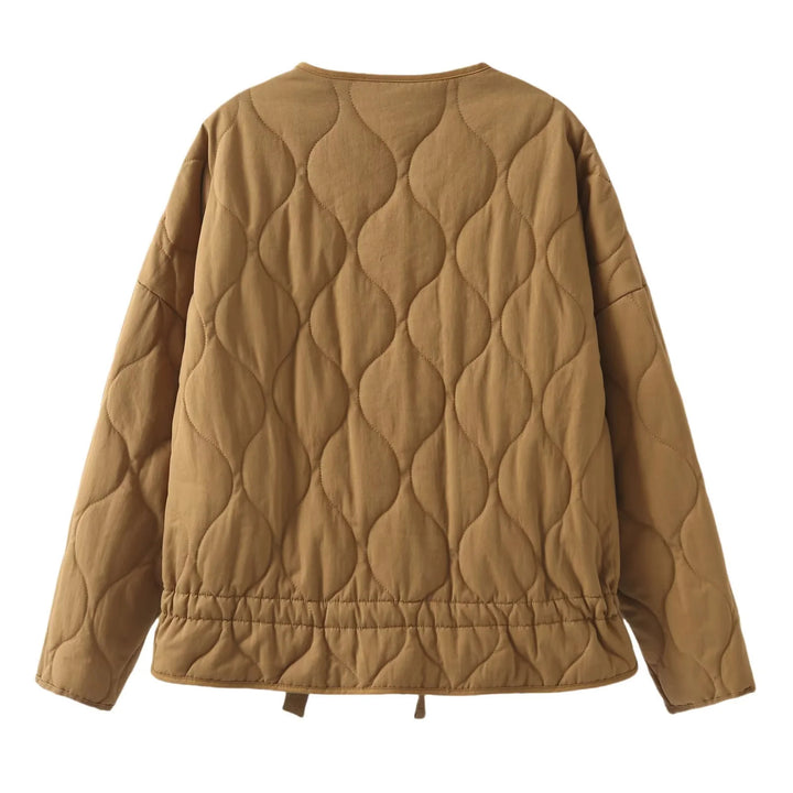 Ladies' nan quilted lightweight transitional jacket with wave quilting, patch flap pockets, and drawstring hem Mune Fashion
