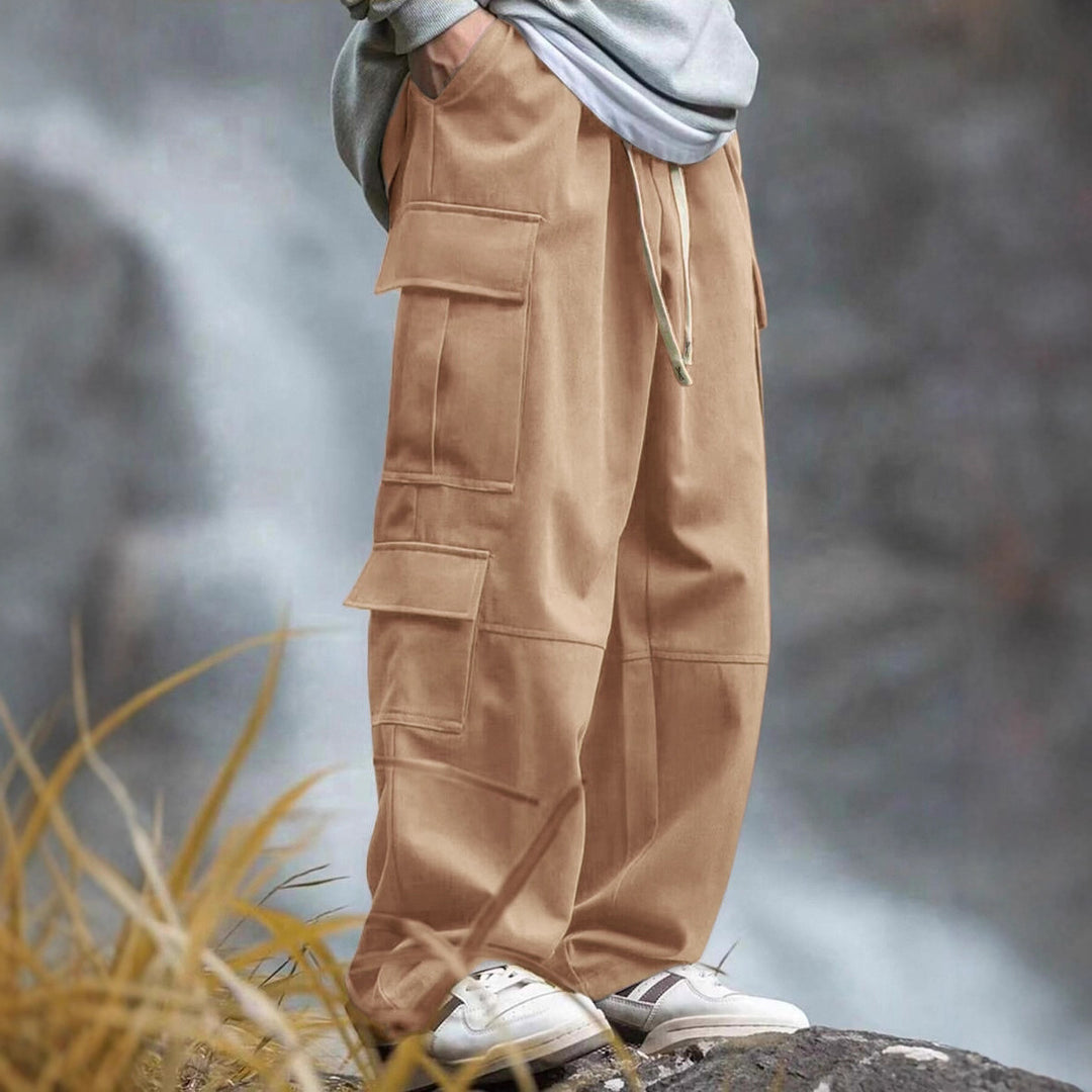 Men's casually cut multiple pockets cargo pants with wide leg and prominent knee darts Mune Fashion