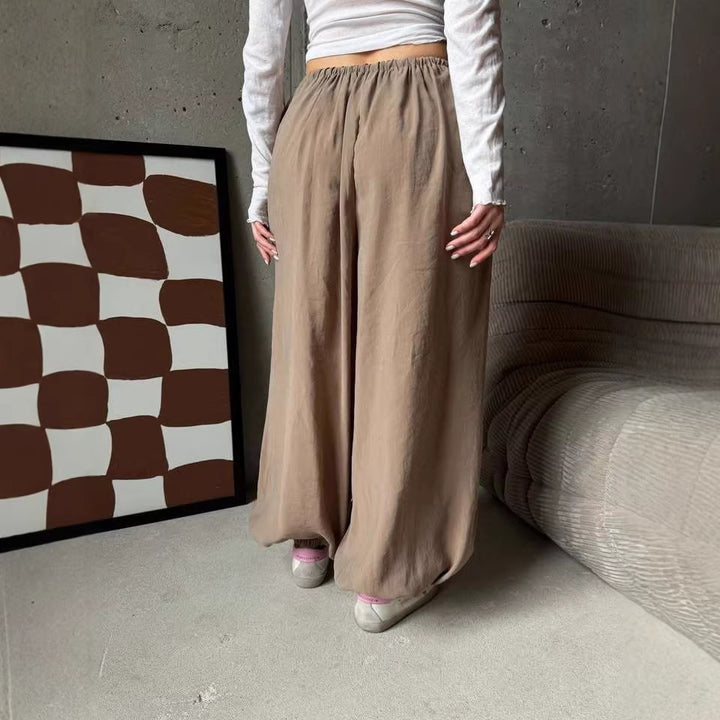 Women's wide harem balloon pants with high elastic waistband, drawstring, and casual wide fit.
