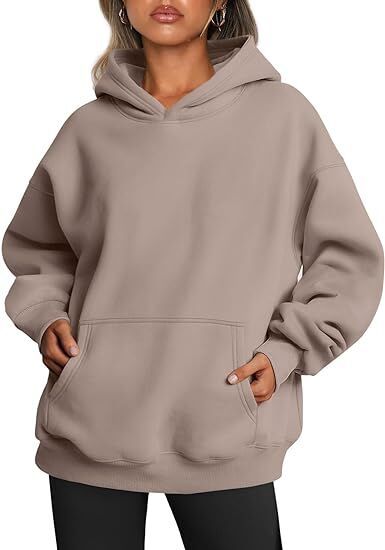 Women's oversized hooded sweatshirt made of soft cotton blend with kangaroo pocket Mune Fashion