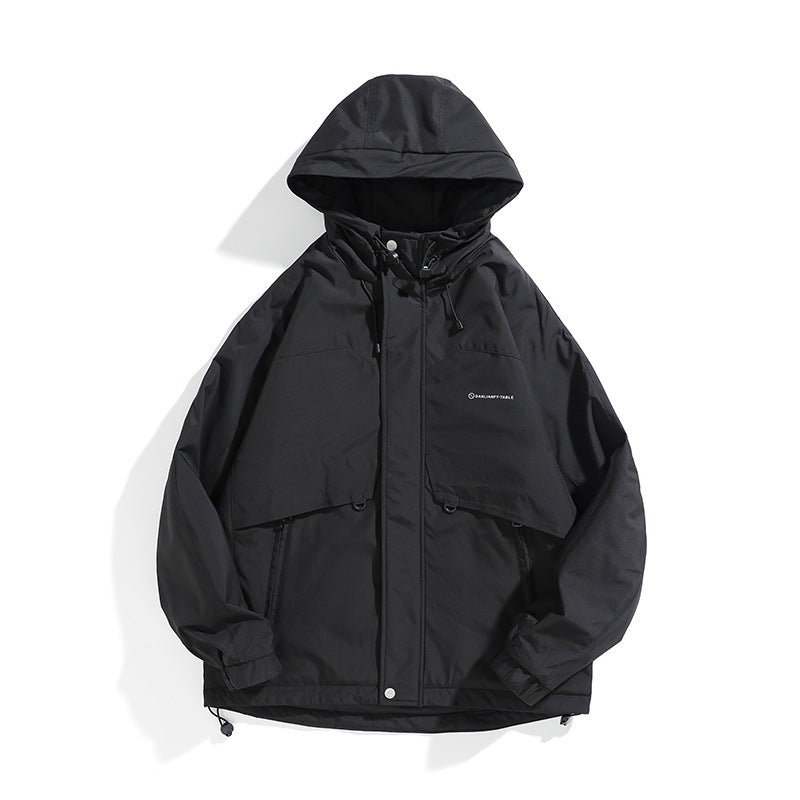 Unisex Wide cut weatherproof parka with hood, drawstring and patch pockets Mune Fashion