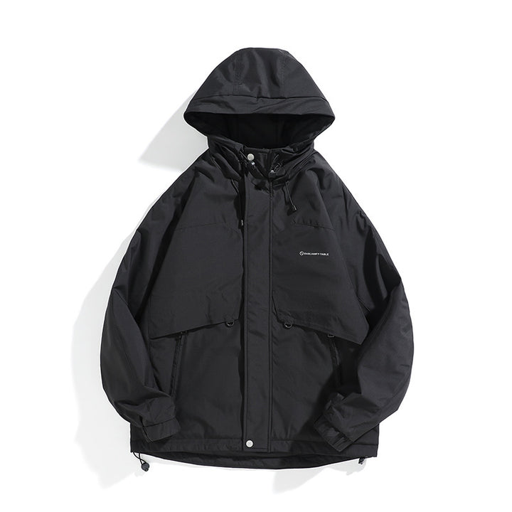 Unisex Wide cut weatherproof parka with hood, drawstring and patch pockets Mune Fashion