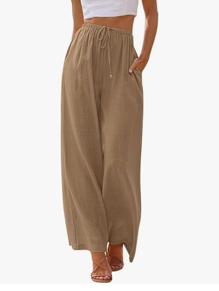 Women's wide linen pants with elastic waistband, drawstring, and side pockets Mune Fashion