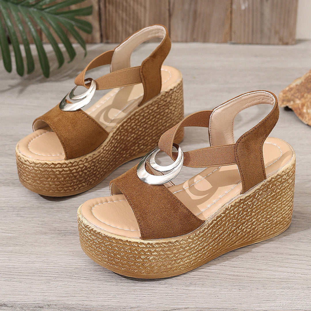Women's retro-style wedge sandals with jute look, decorative metal ornament, and elastic heel strap Mune Fashion