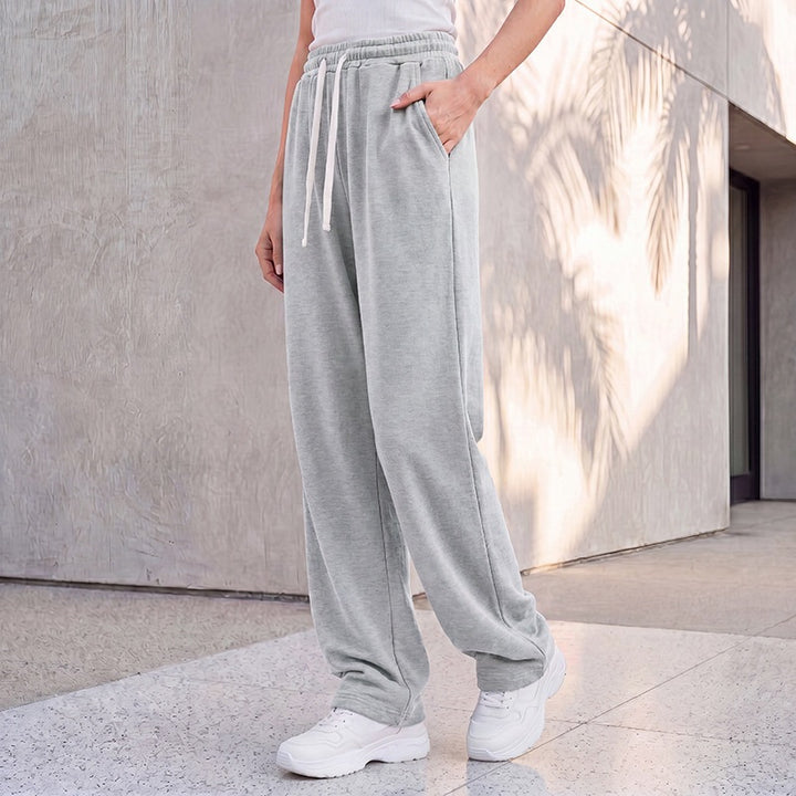 Women's wide lounge palazzo pants with high comfort waistband, drawstring, side pockets, and decorative side seam Mune Fashion