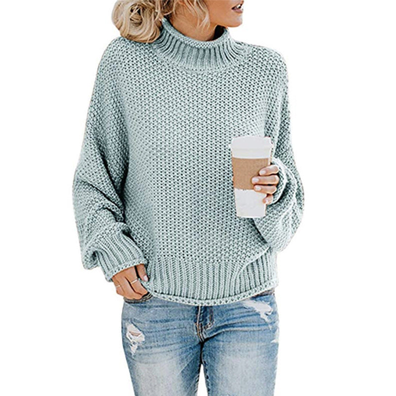 Women's chunky knit turtleneck sweater with oversized cut and block stripe design Mune Fashion