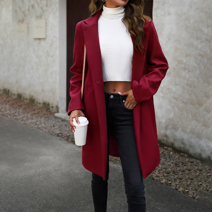 Women's longer tailored wool blend coat with lapel collar, concealed button placket and side pockets Mune Fashion