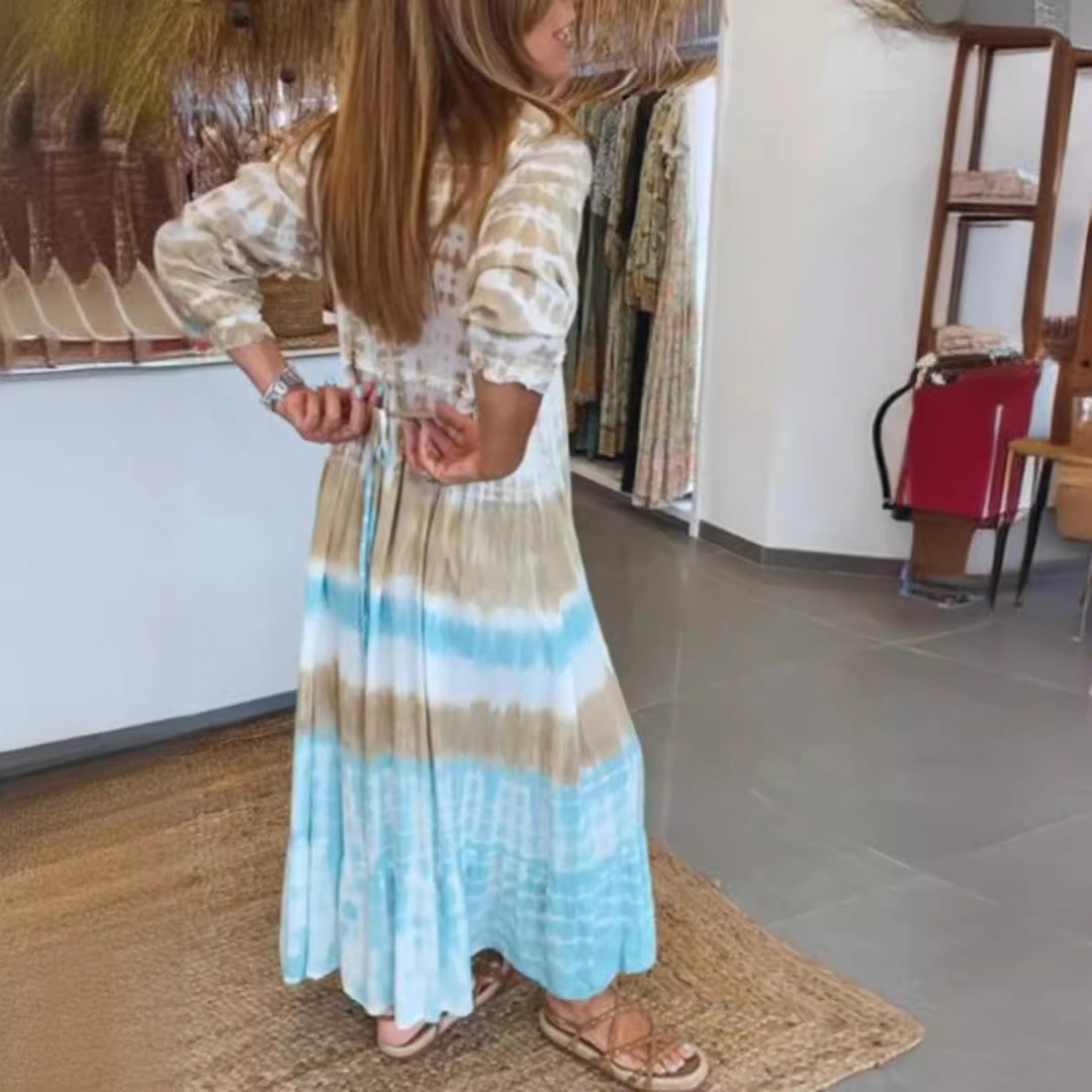 Women's airy batik tiered dress with V-neck, empire waist, and elastic sleeves Mune Fashion