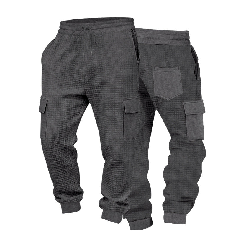 Men's cargo jogging pants with waffle texture, elastic waistband, and flap pockets Mune Fashion