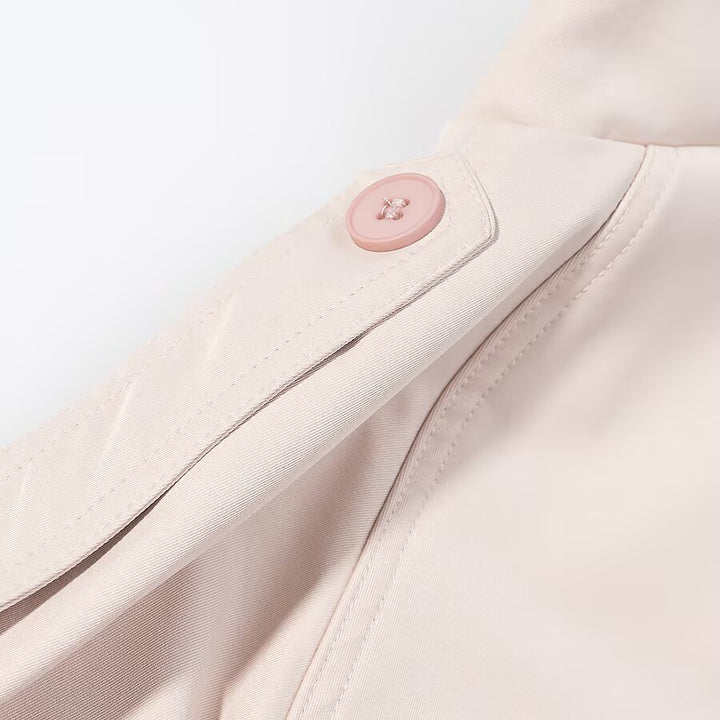Women's short double-breasted trench coat with high standing collar, shoulder flaps and tie belt Mune Fashion