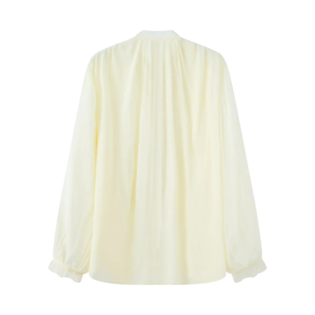 Women's delicate long sleeve blouse with tie ribbon at the neck and fine button placket Mune Fashion