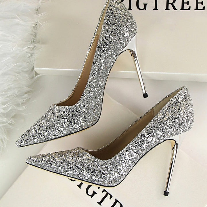 Ladies glitter pumps with pointed toe shape and metallic stiletto heel Mune Fashion
