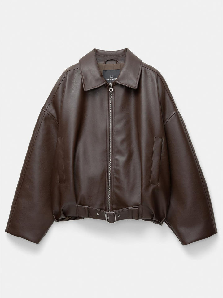 Women's stylish faux leather jacket with eye-catching collar and waist belt