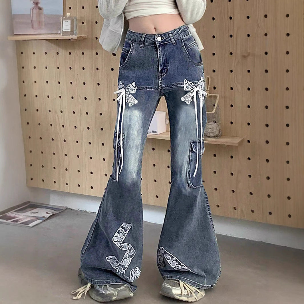 Women's wide flared cargo-style jeans with decorative ribbons, lace appliqués, and multiple pockets Mune Fashion