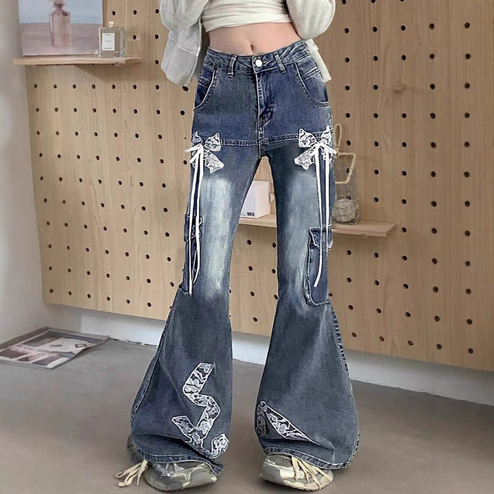 Women's wide flared cargo-style jeans with decorative ribbons, lace appliqués, and multiple pockets Mune Fashion