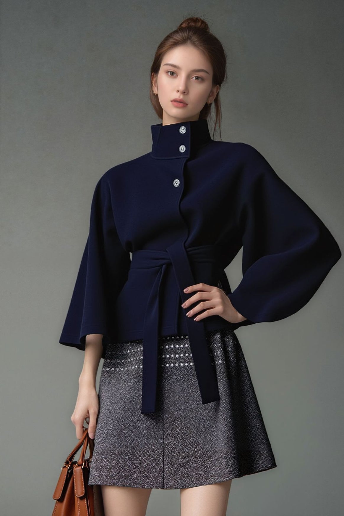 Women's short cape jacket with high stand-up collar, tie belt and boxy silhouette Mune Fashion