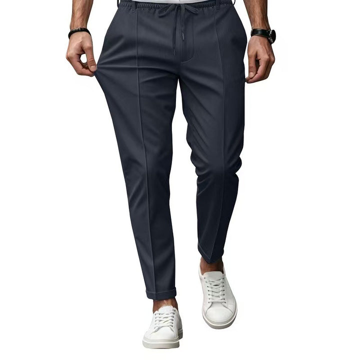 Men's elegant straight-cut chino jogging pants with crease, elastic waistband and drawstring Mune Fashion