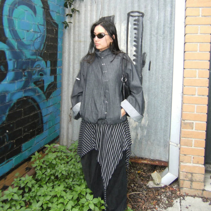 Women’s oversized boxy jacket with asymmetric button closure and arm pocket Mune Fashion