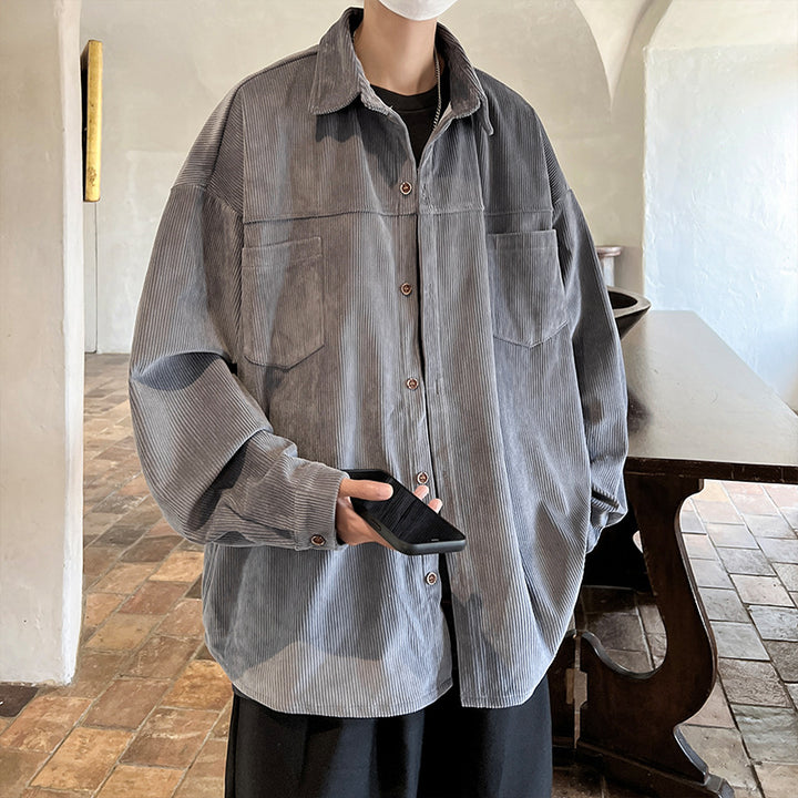 Men's oversized cord shirt jacket with stitched breast pockets, rounded hem, and loose silhouette Mune Fashion