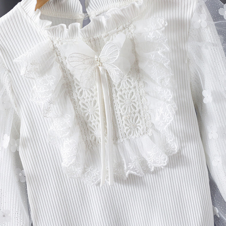 Girl ruffled blouse with floral appliqués and transparent sleeves Mune Fashion