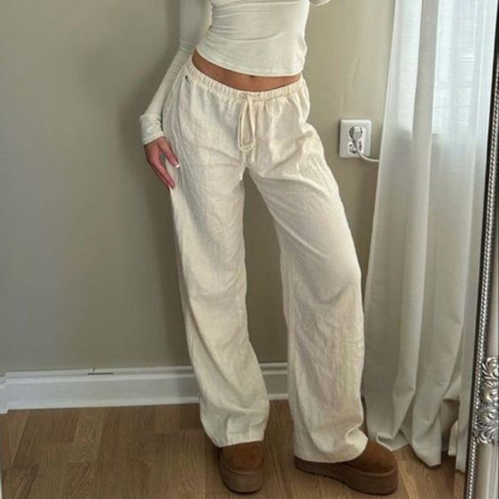 Women's wide jogging pants with high waistband, drawstring and palazzo silhouette Mune Fashion