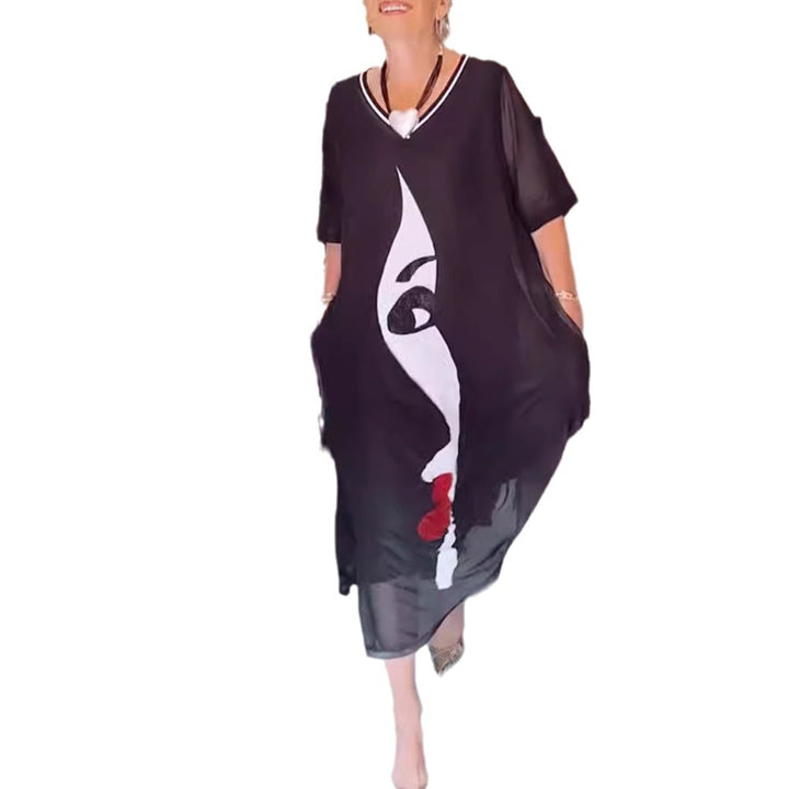 Women's airy chiffon maxi dress with graphic face print, V-neck and side pockets Mune Fashion