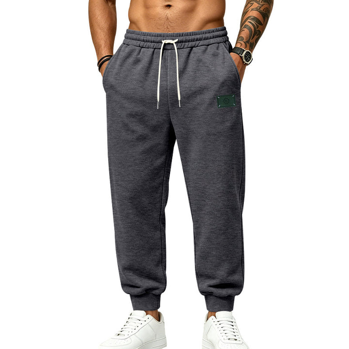 Men's casually cut sweat jogging pants with elastic waistband, drawstring, and cuffs Mune Fashion