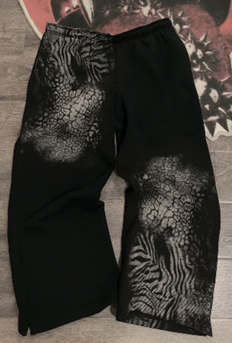 Women nan loose sweatpants with asymmetrical animal print, elastic comfort waistband and straight leg Mune Fashion