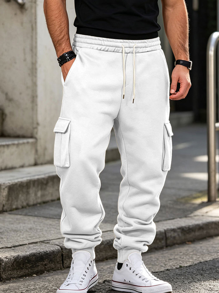 Men's cargo jogging pants made of cotton fleece with elastic waistband and leg cuffs Mune Fashion
