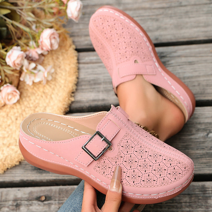 Women's comfort mule with adjustable buckled strap and ornamental hole embossing Mune Fashion