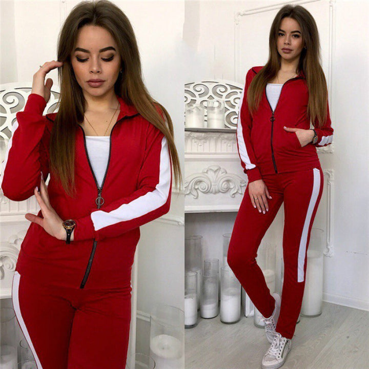 Women's tracksuit made of stretch material with side contrast stripe and zipper Mune Fashion