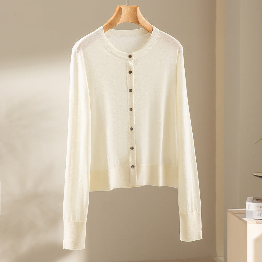 Women's light fine knit cardigan in cropped cut with round neck and continuous button placket Mune Fashion