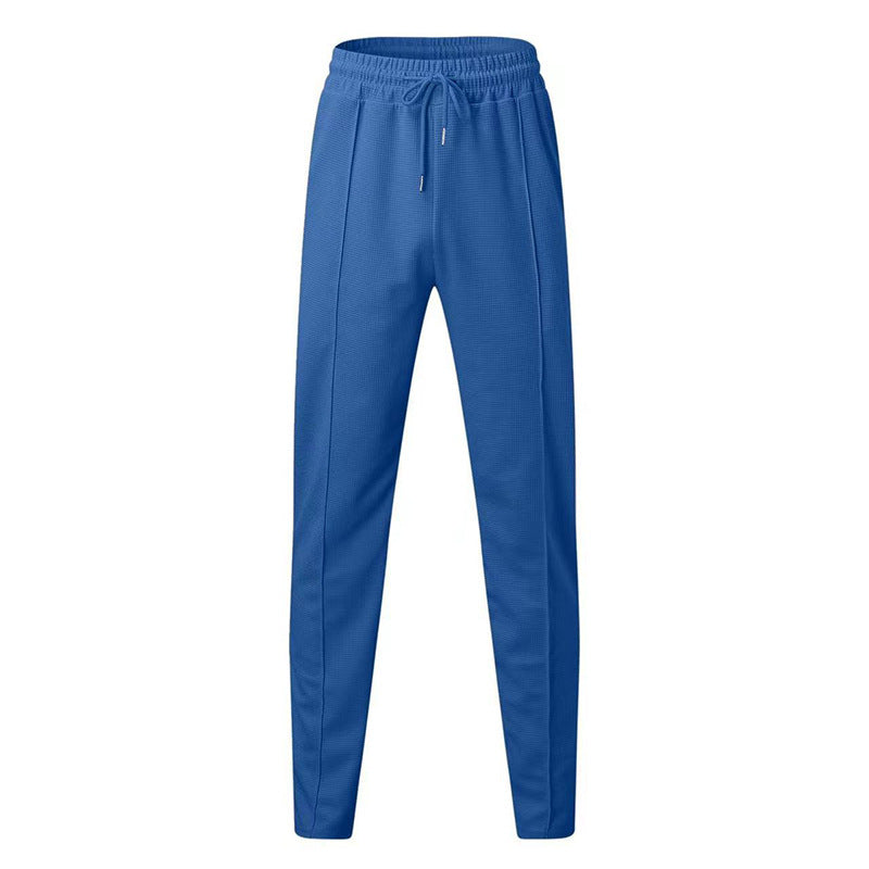 Men's patterned jogging pants with elastic drawstring, shaping crease, and tapered leg Mune Fashion