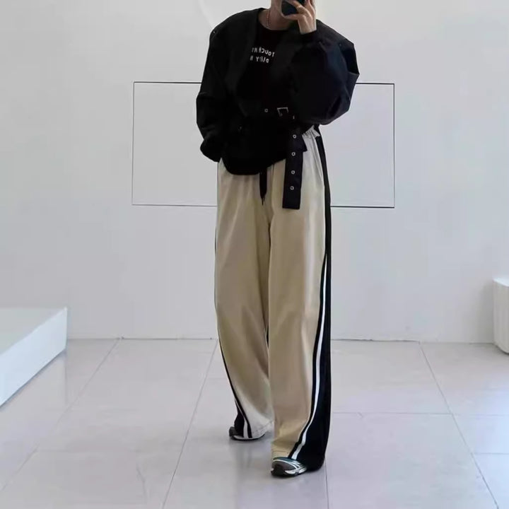 Unisex wide two-tone jogging pants with side stripes and drawstring Mune Fashion