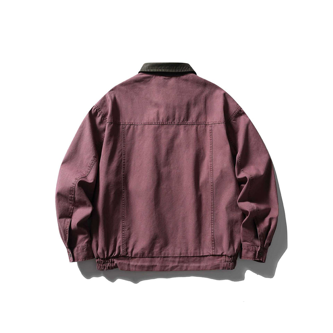 Men's tailored canvas blouson with contrasting leather collar and elastic hem.