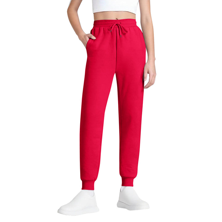 Women's slim high-waisted joggers with drawstring, side pockets, and cuffs Mune Fashion